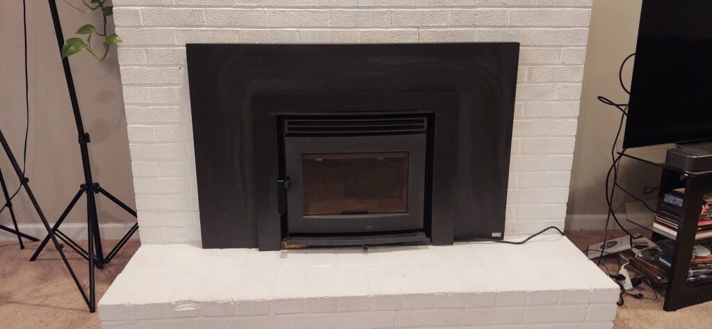 Woodburning fireplace stove insert project by Trinity Chimney