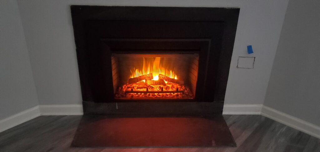 Electric fireplace insert installed by Trinity Chimney